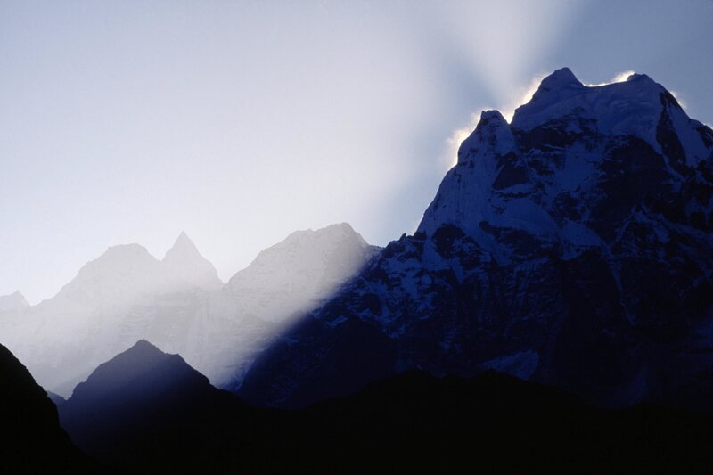 Sunlight on snow-capped mountains