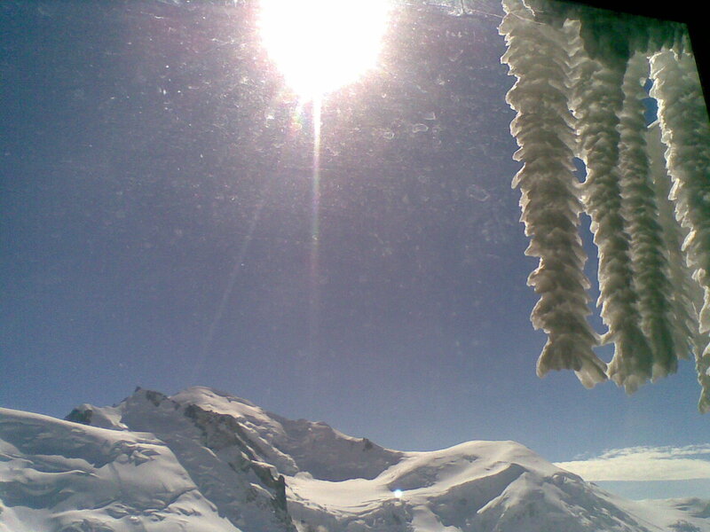 Sunlight on snowy mountains