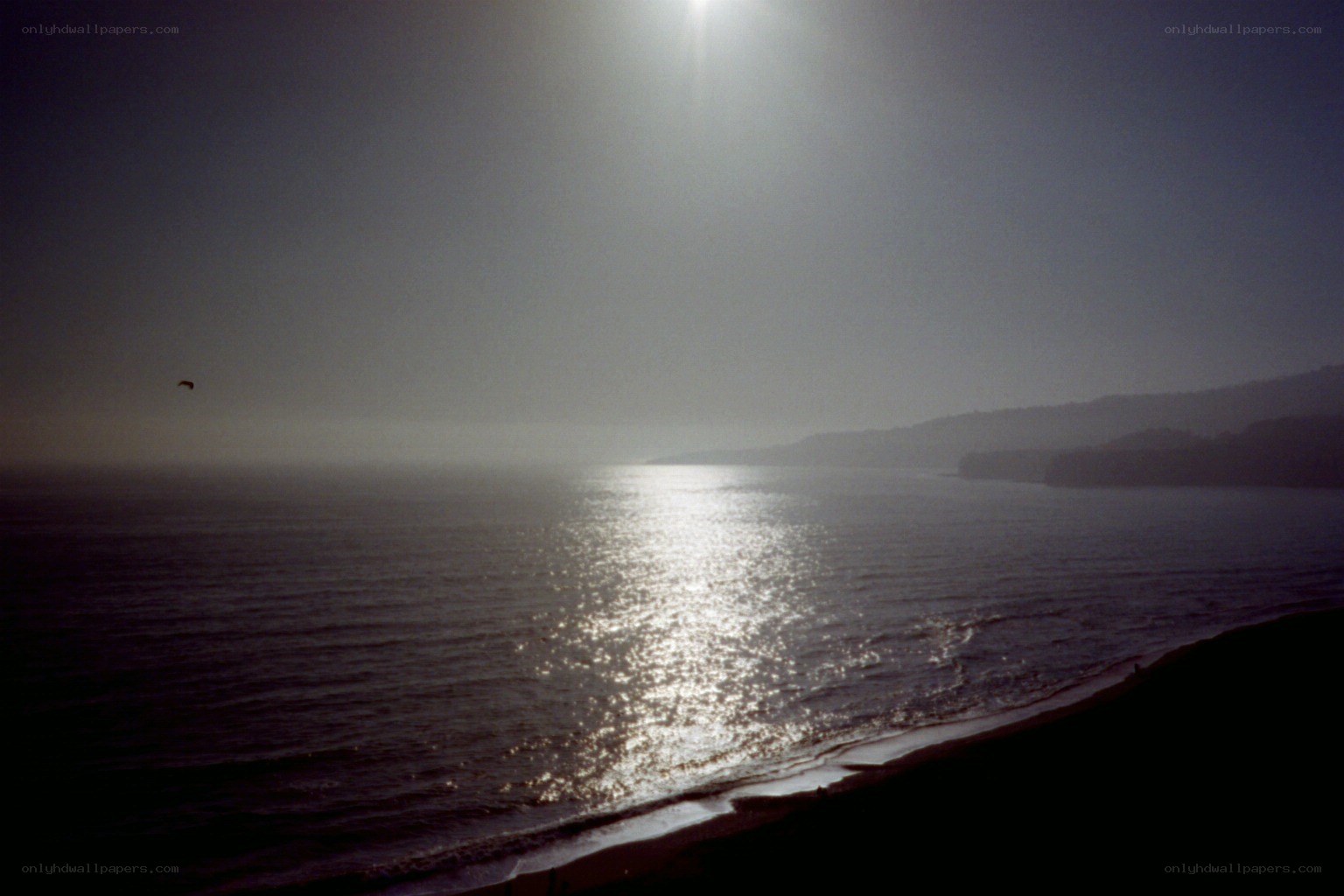 Sunlight on the ocean at dusk