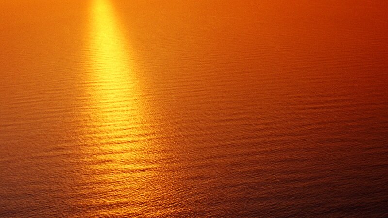 Sunlight on Water Surface — Orange