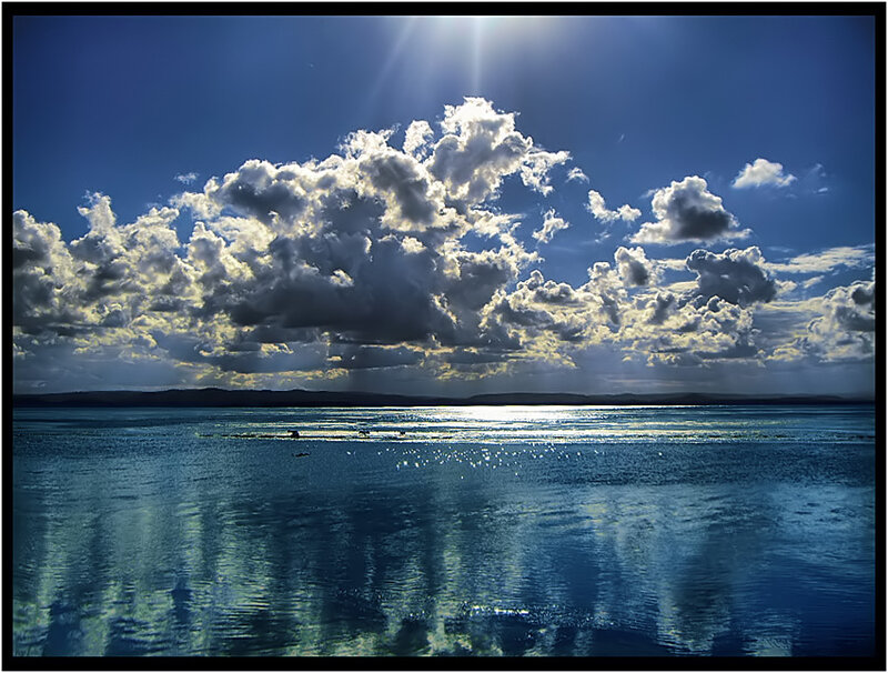 Sunlight over a calm sea