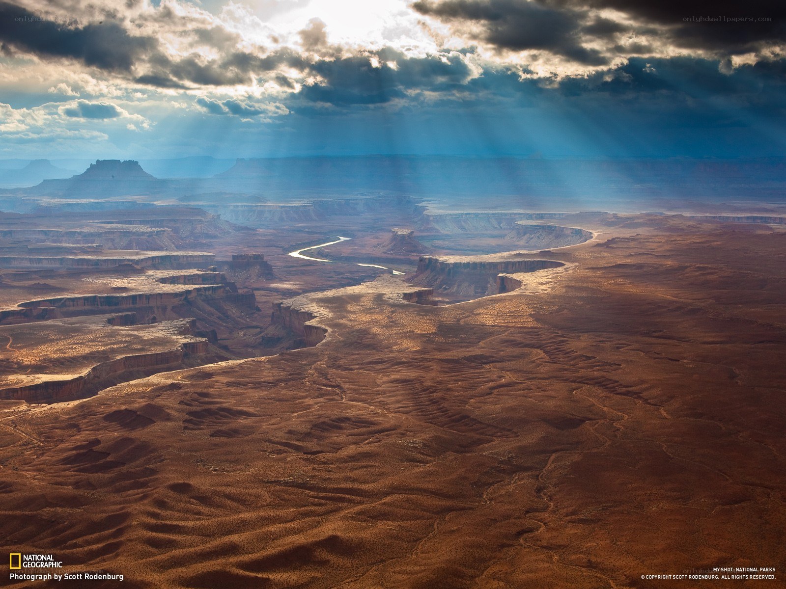 Sunlight over a desert canyon
