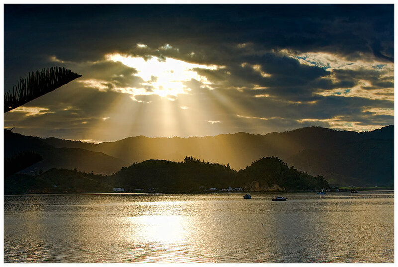 Sunlight over a lake at sunset