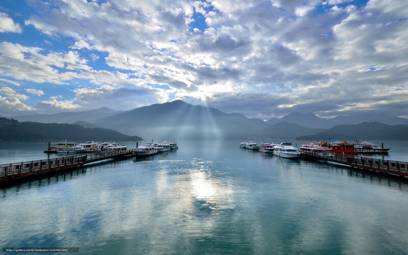 Sunlight over a lake harbor