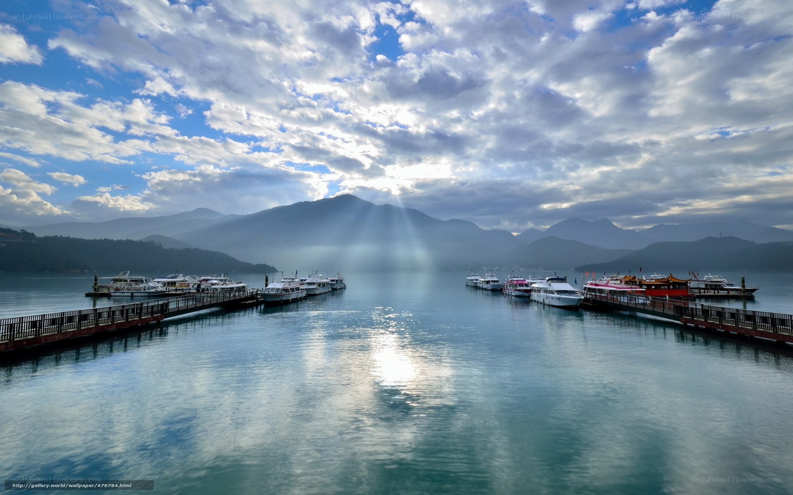 Sunlight over a lake harbor