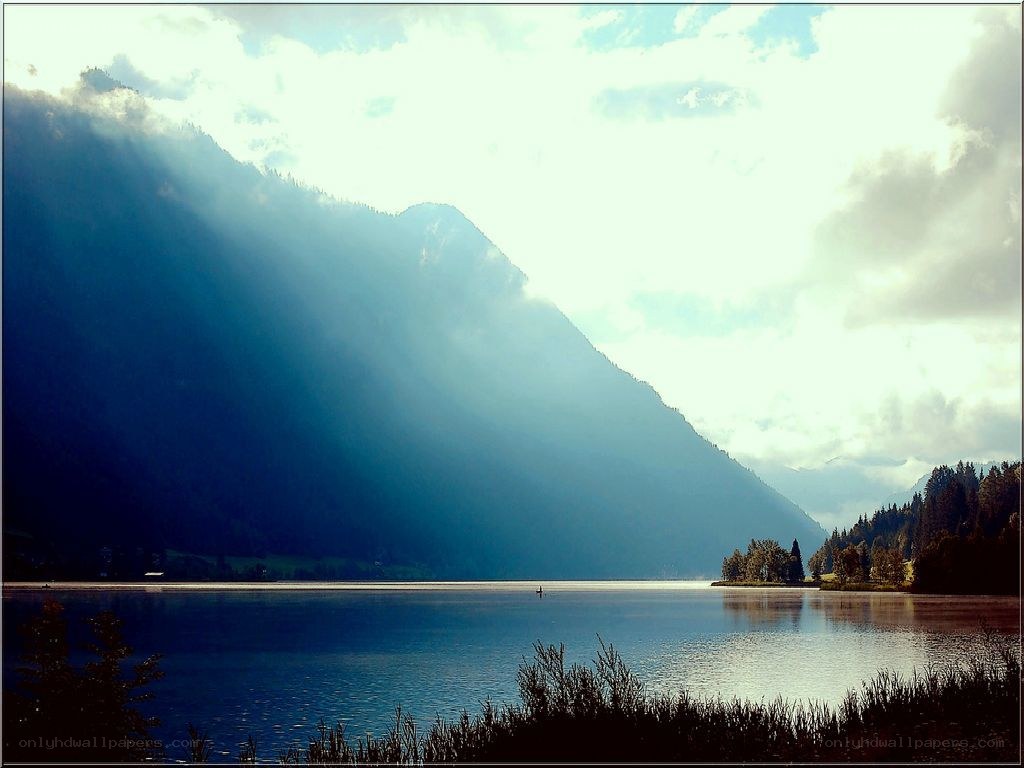 Sunlight over a mountain lake