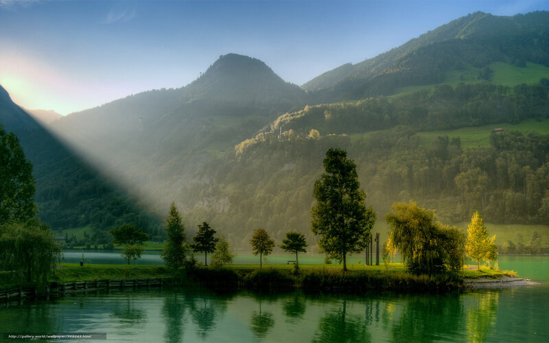 Sunlight over a mountain lake