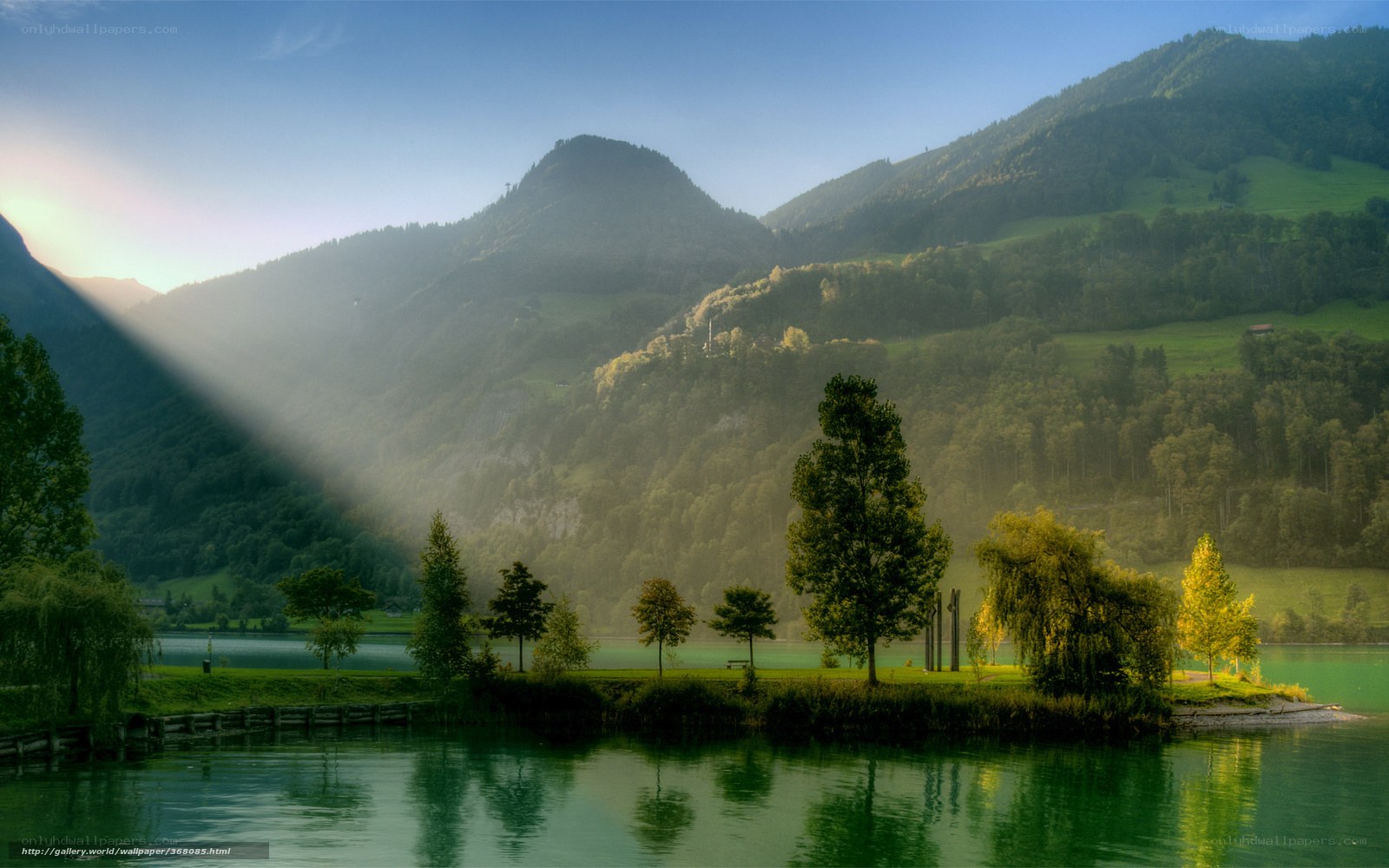 Sunlight over a mountain lake