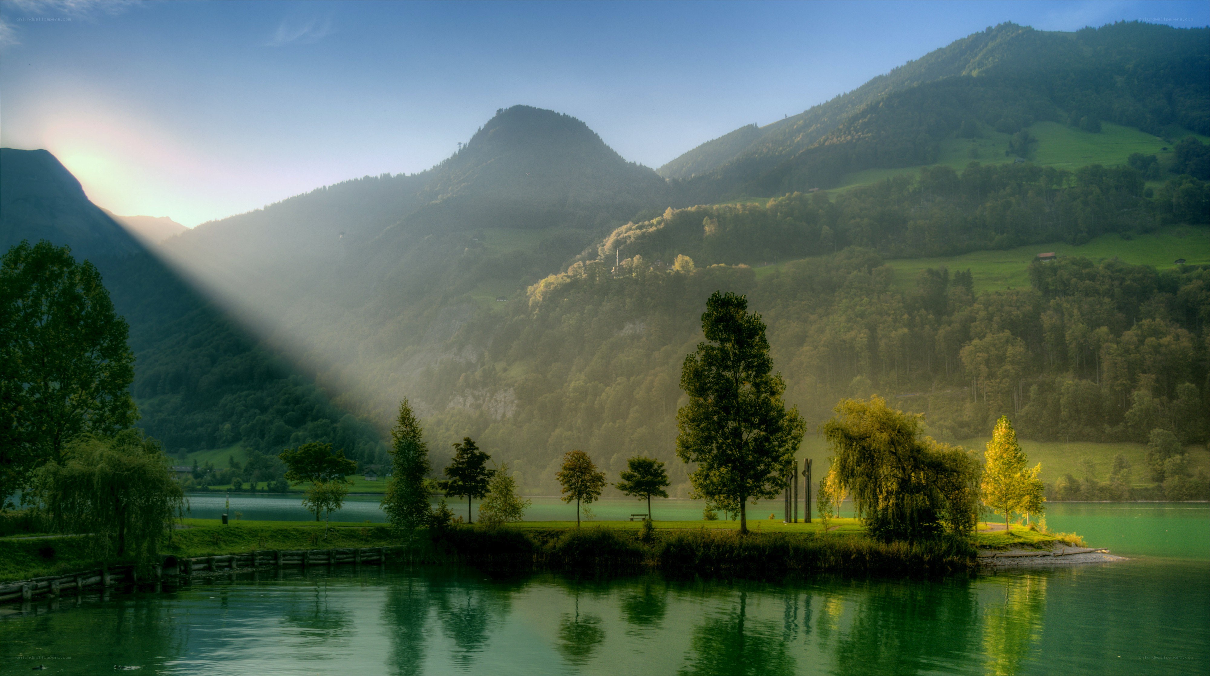Sunlight over a mountain lake