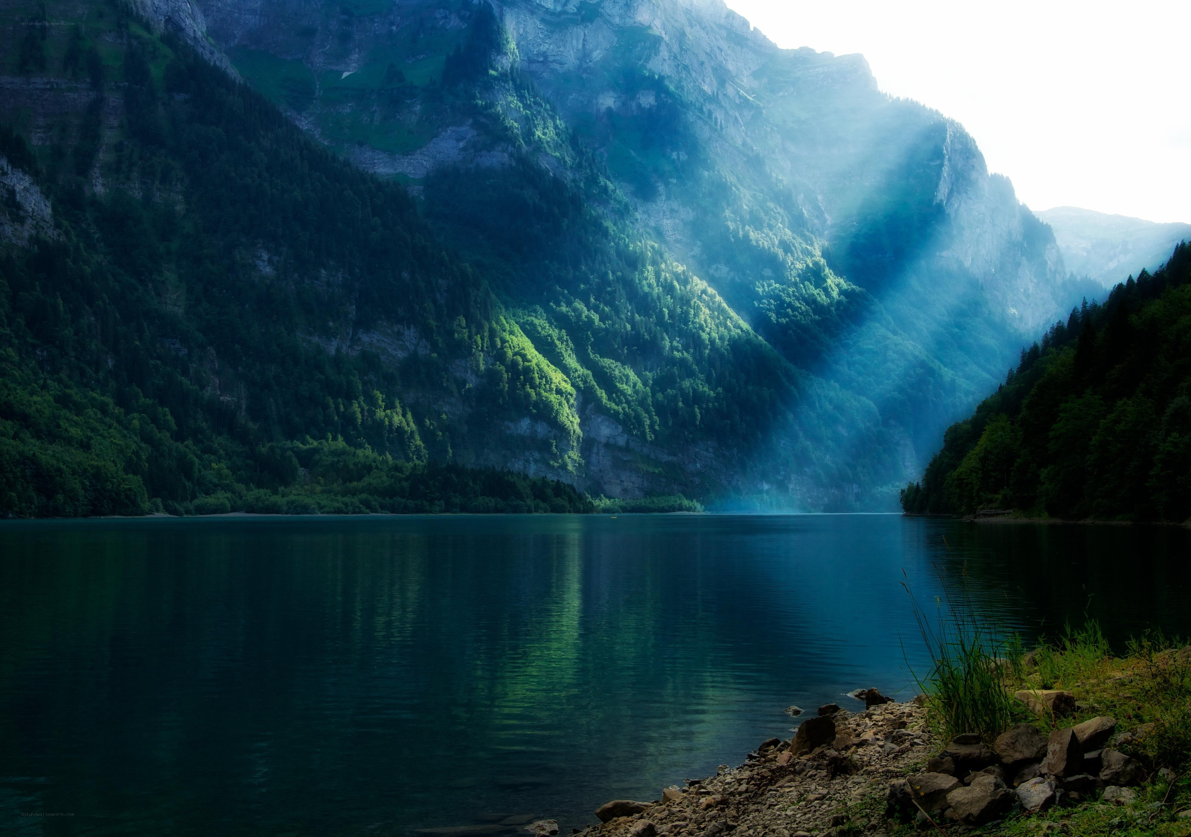 Sunlight over a mountain lake