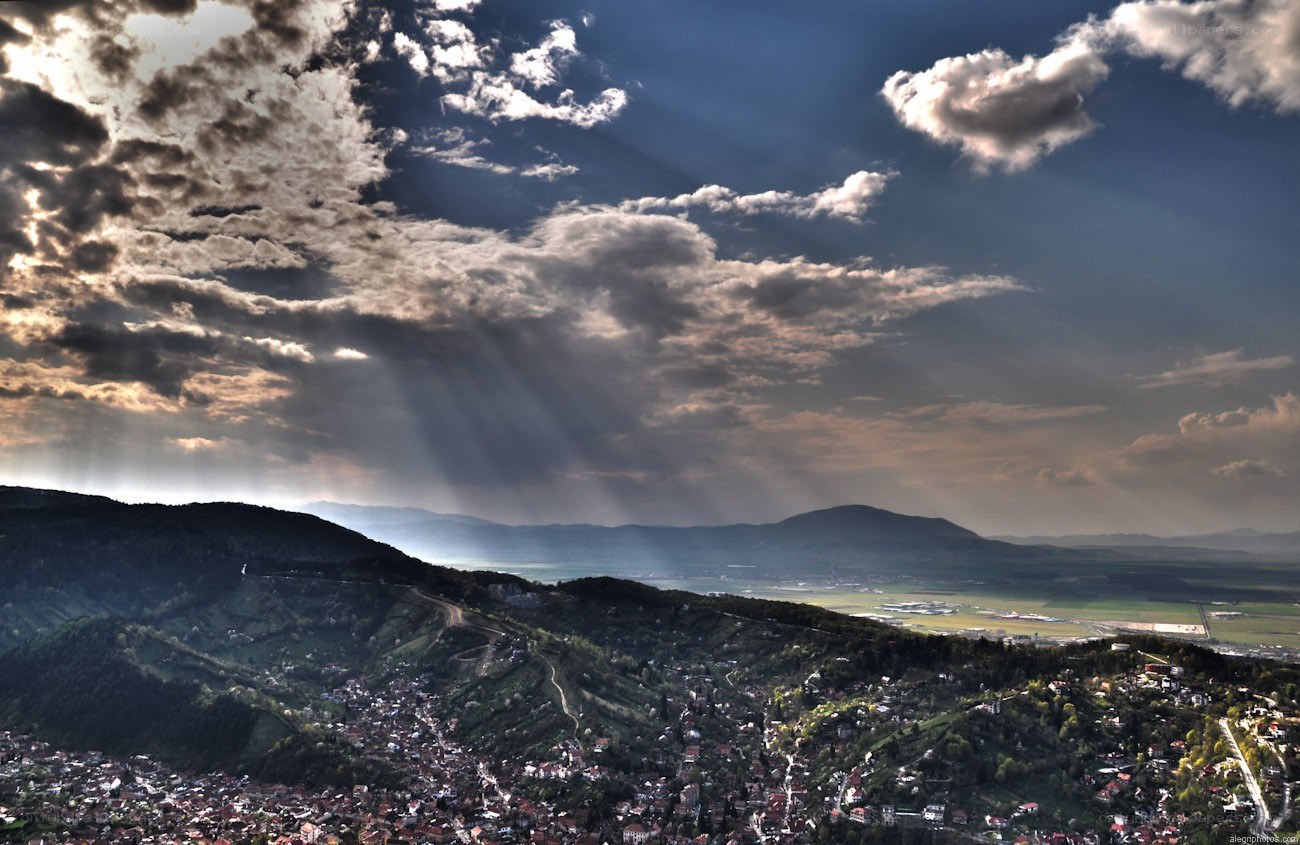Sunlight over a mountain town