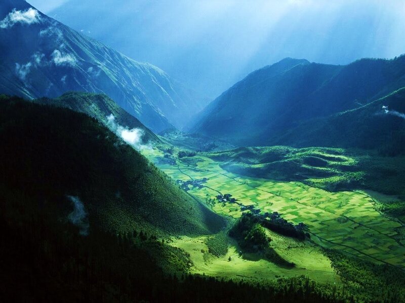 Sunlight over a mountain valley