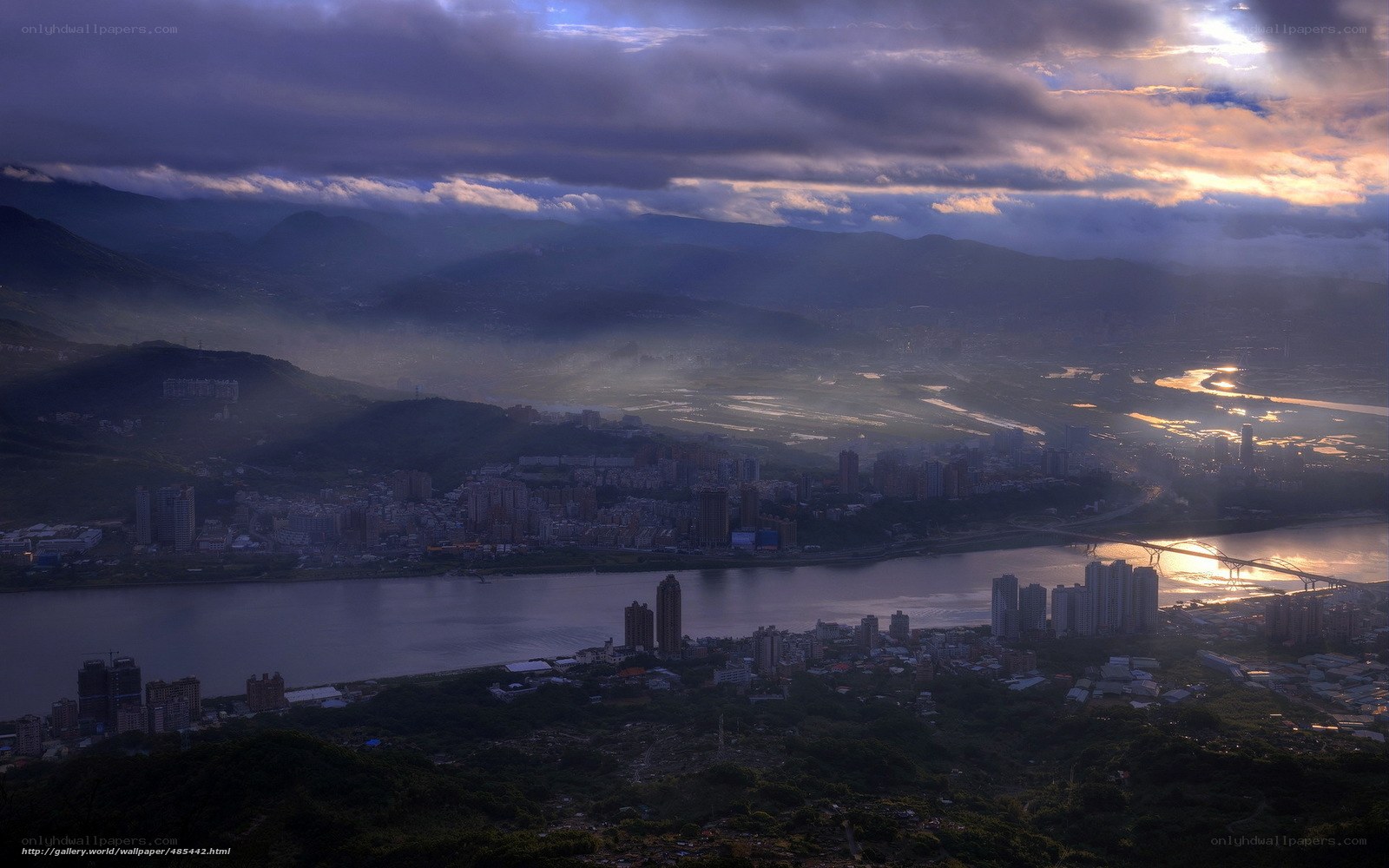 Sunlight over a river city