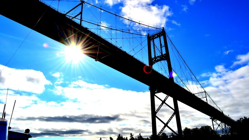 Sunlight over a suspension bridge
