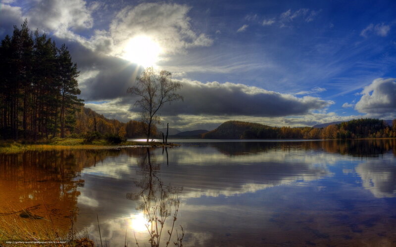 Sunlight over a tranquil lake