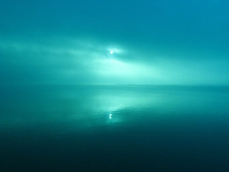 Sunlight over calm sea