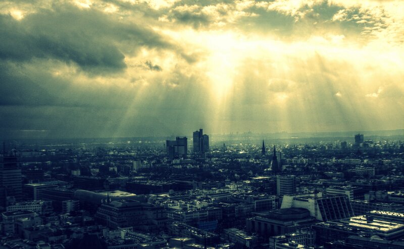 Sunlight over city skyline