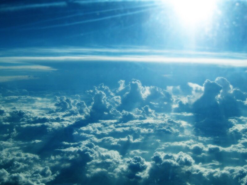 Sunlight over clouds from above