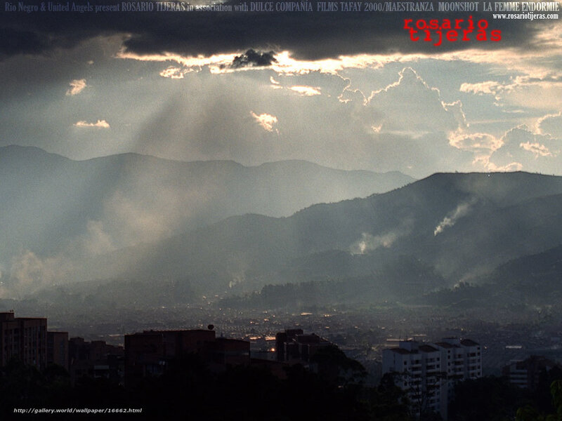Sunlight over mountain city