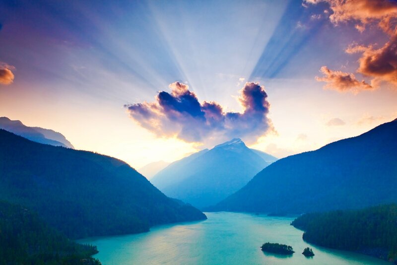 Sunlight over mountain lake