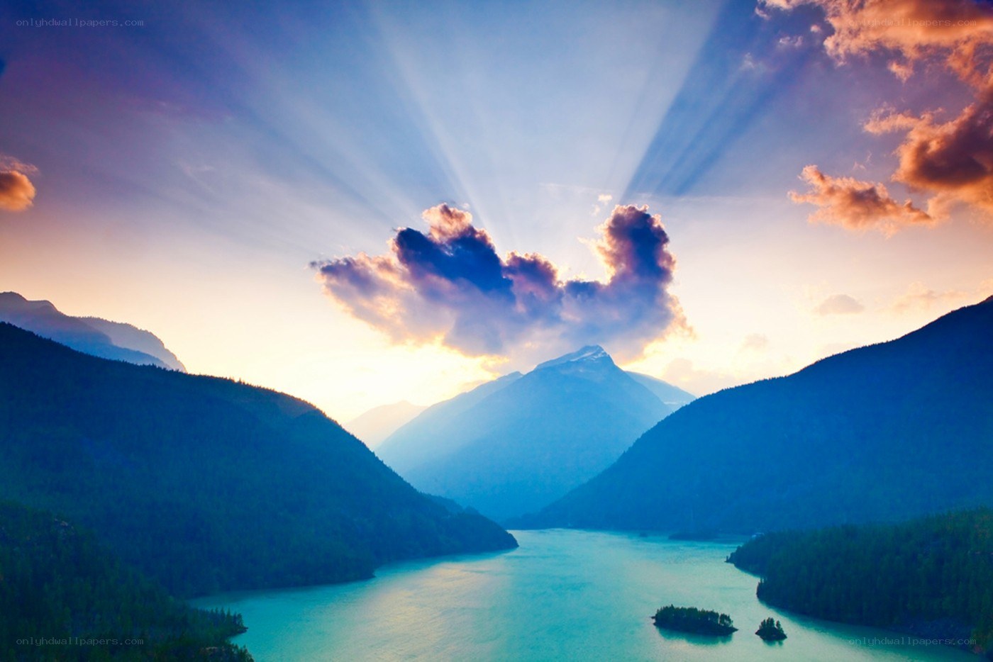 Sunlight over mountain lake