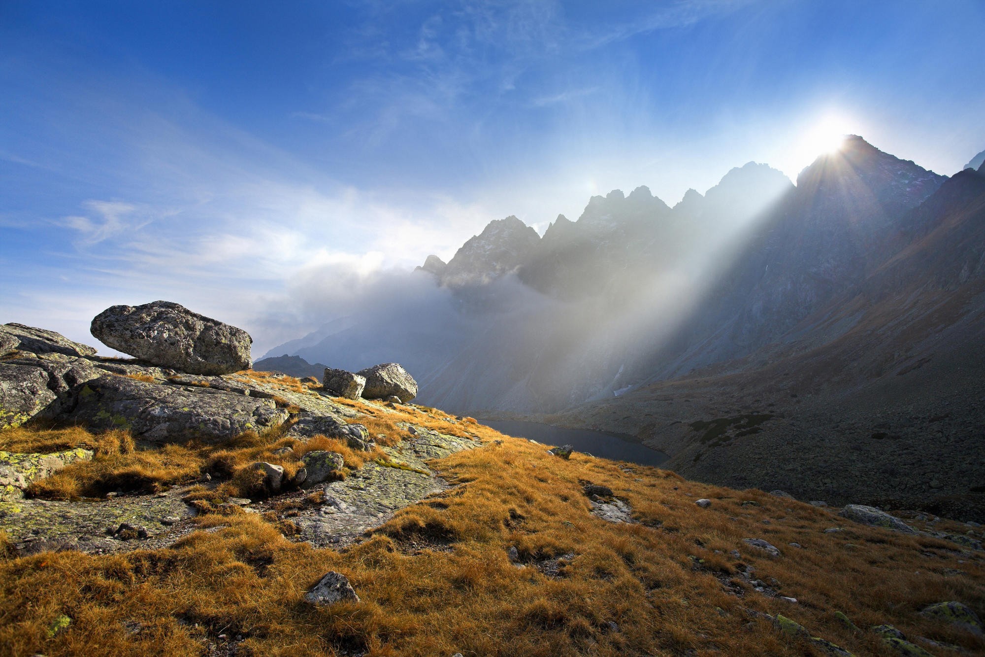 Sunlight over mountain peaks