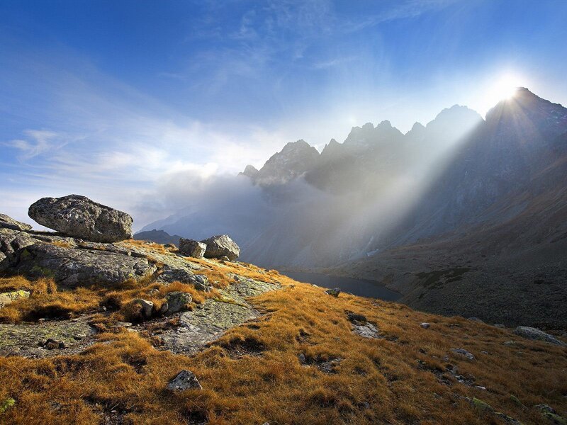 Sunlight over mountain peaks