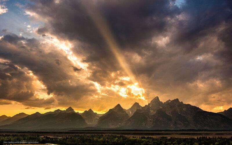 Sunlight over mountain range