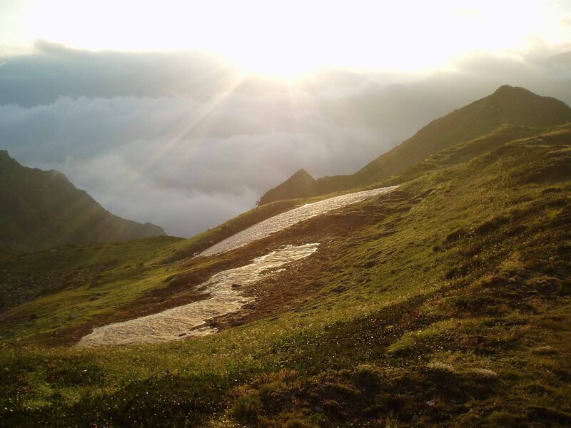 Sunlight over mountain stream