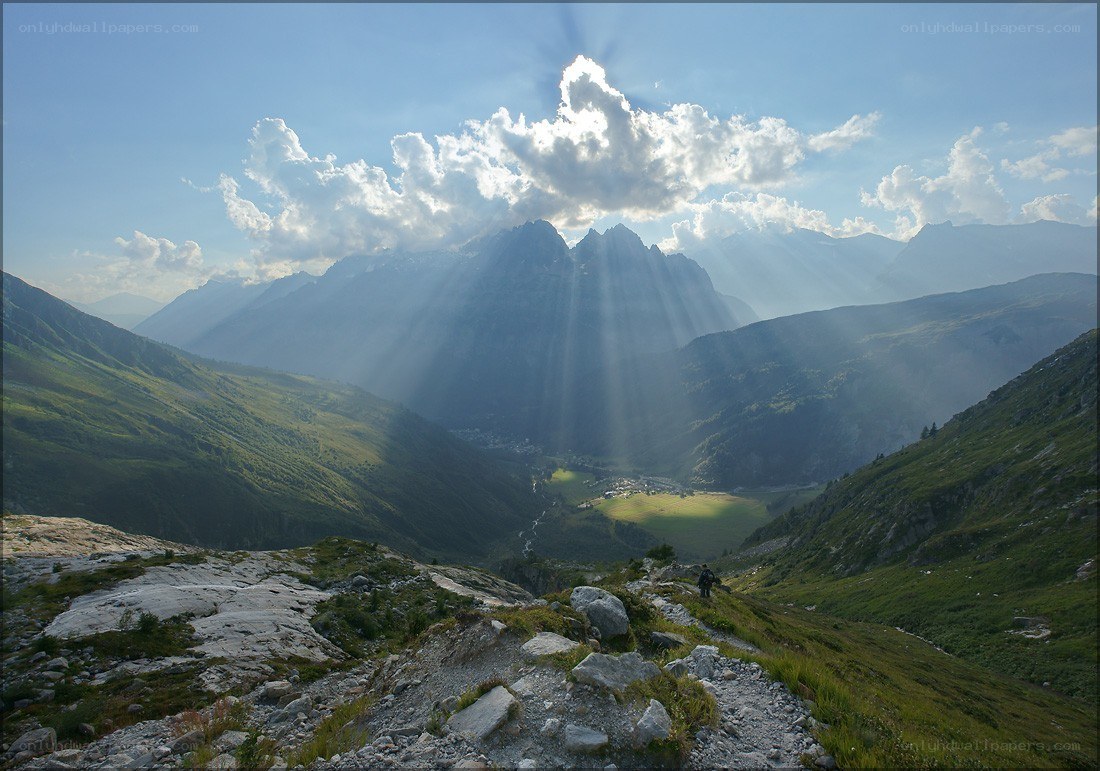 Sunlight over mountain valley