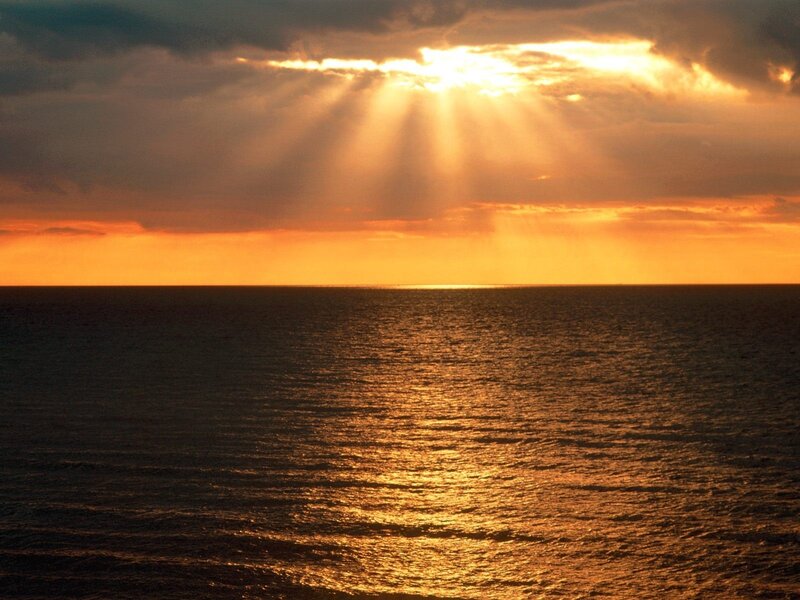 Sunlight over Ocean — Orange, Dramatic, Sunset