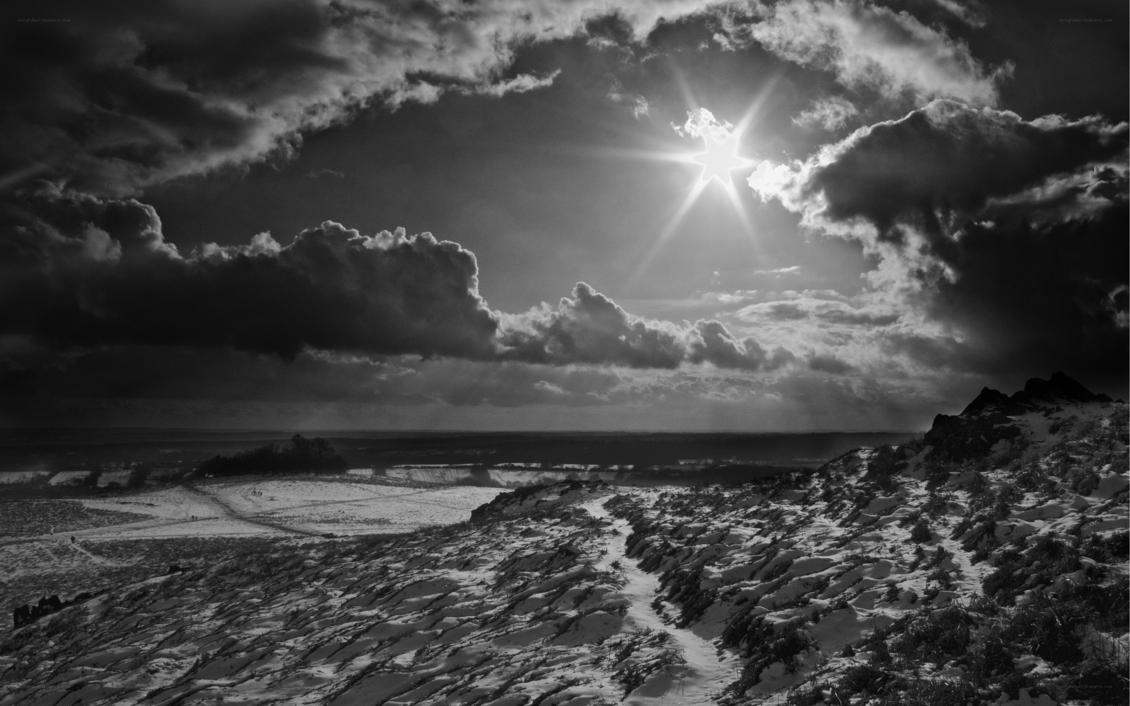 Sunlight over snowy landscape