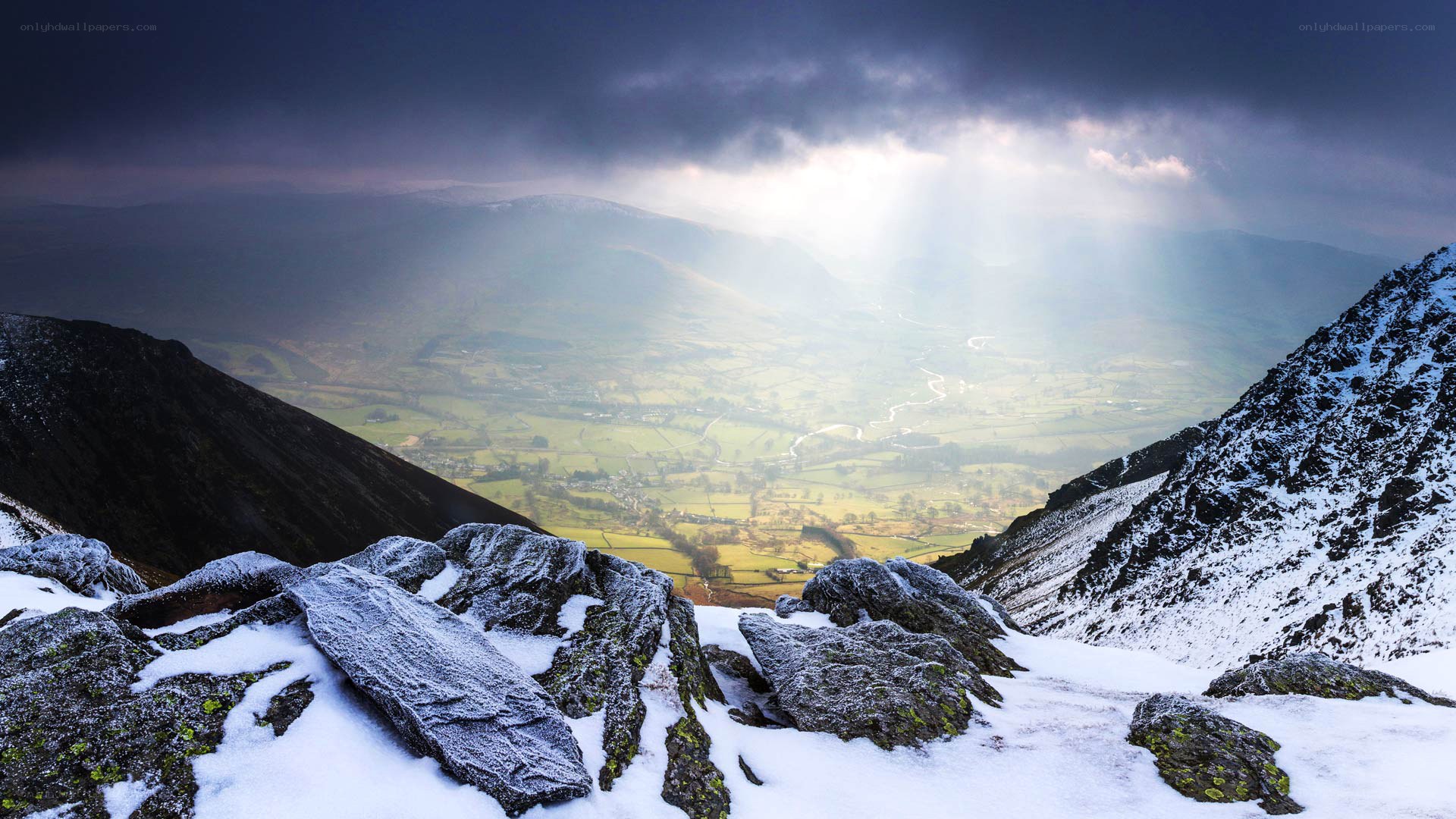 Sunlight over snowy mountains