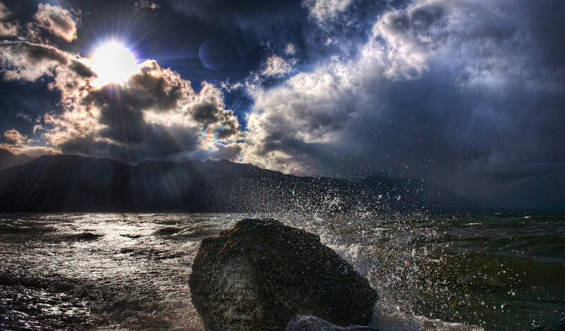 Sunlight over stormy sea