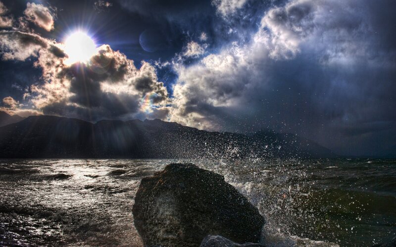 Sunlight over stormy sea