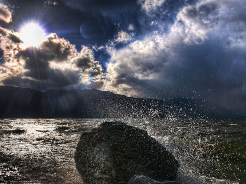 Sunlight over stormy sea