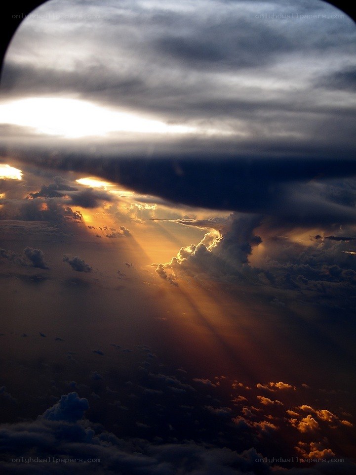 Sunlight piercing storm clouds