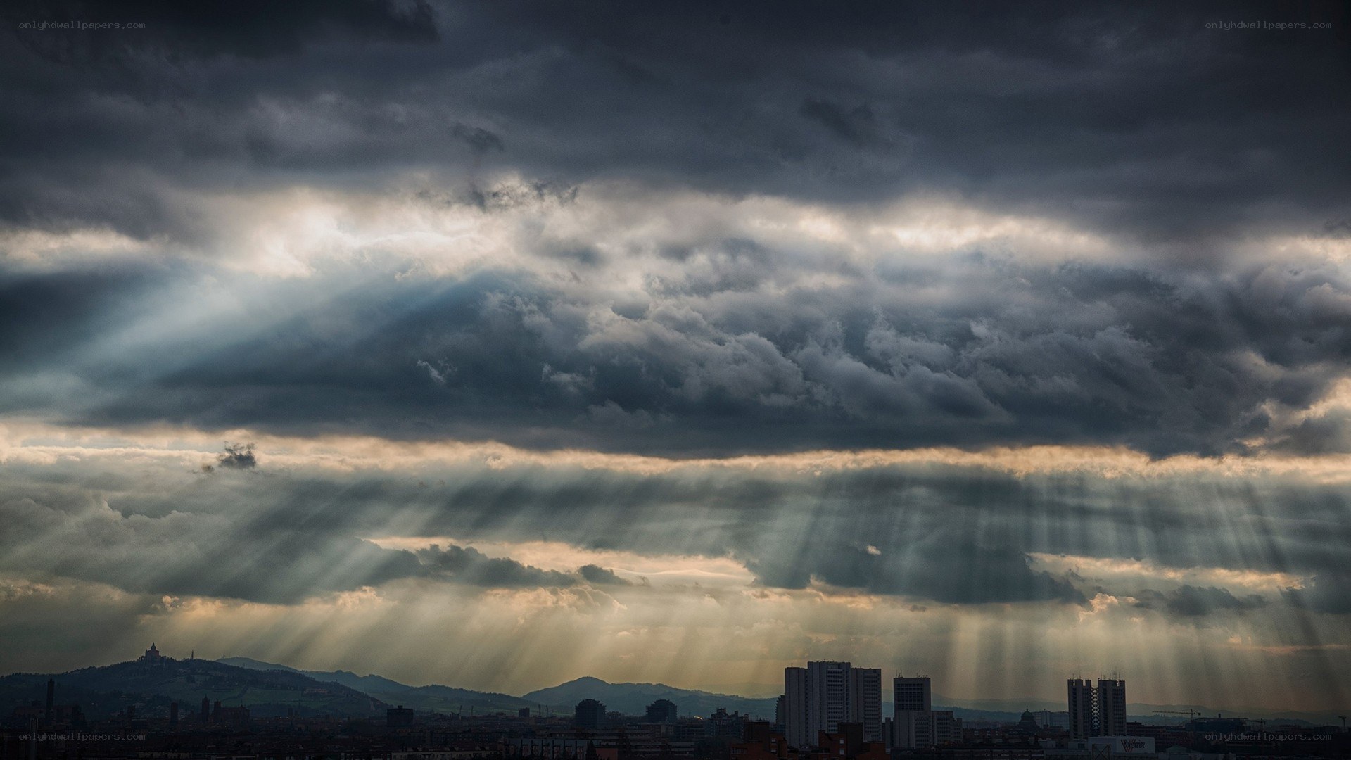 Sunlight piercing storm clouds
