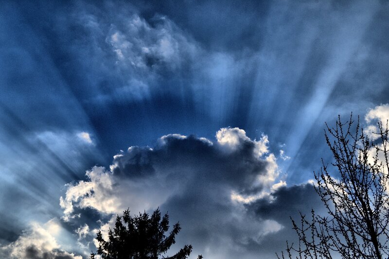 Sunlight piercing storm clouds