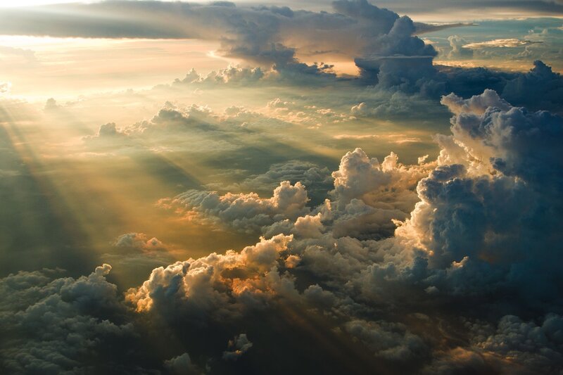 Sunlight piercing through clouds