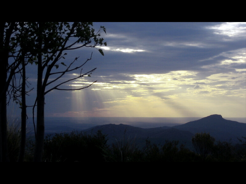 Sunlight rays over mountain range