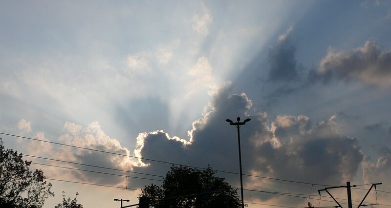 sunlight rays through clouds