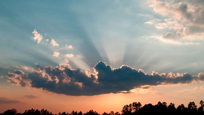 Sunlight rays through clouds