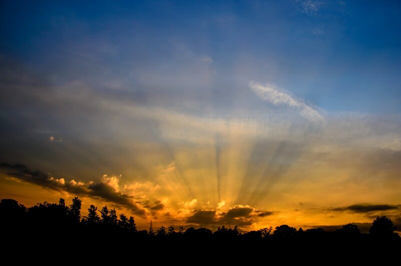 Sunlight Rays Through Clouds — Blue, Dramatic, Sunset, Photograph