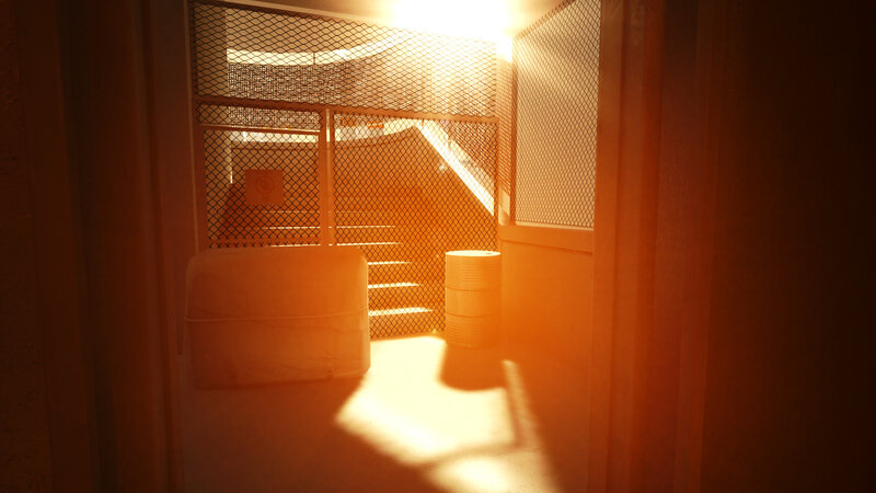 Sunlight through a mesh gate