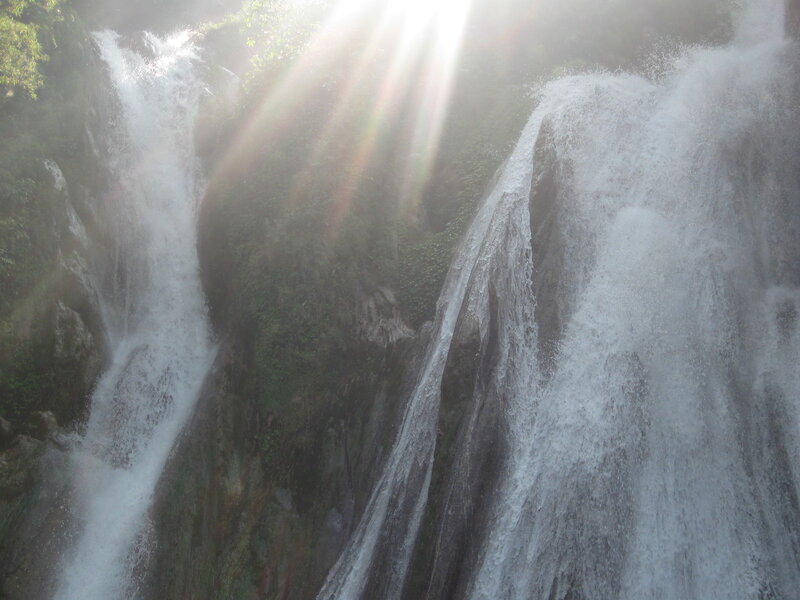Sunlight through a waterfall