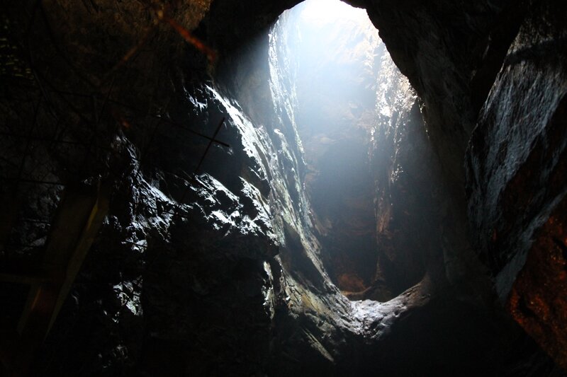 Sunlight Through Cave Opening — Black