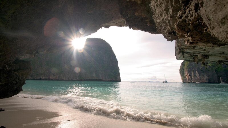 Sunlight Through Cave Opening — Blue, Serene, Afternoon