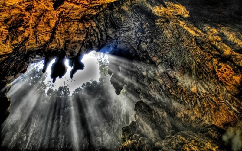 Sunlight Through Cave Opening — Brown, Dramatic