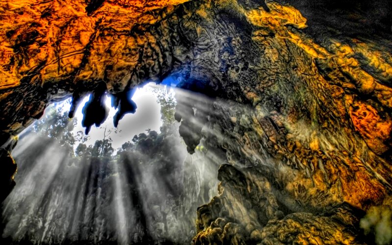 Sunlight Through Cave Opening — Orange
